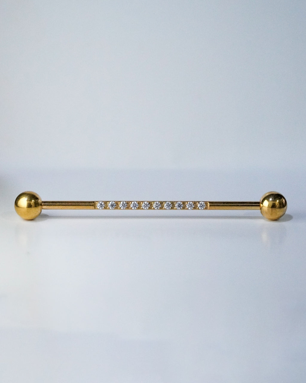 Piercing Industrial Estelar Dorado